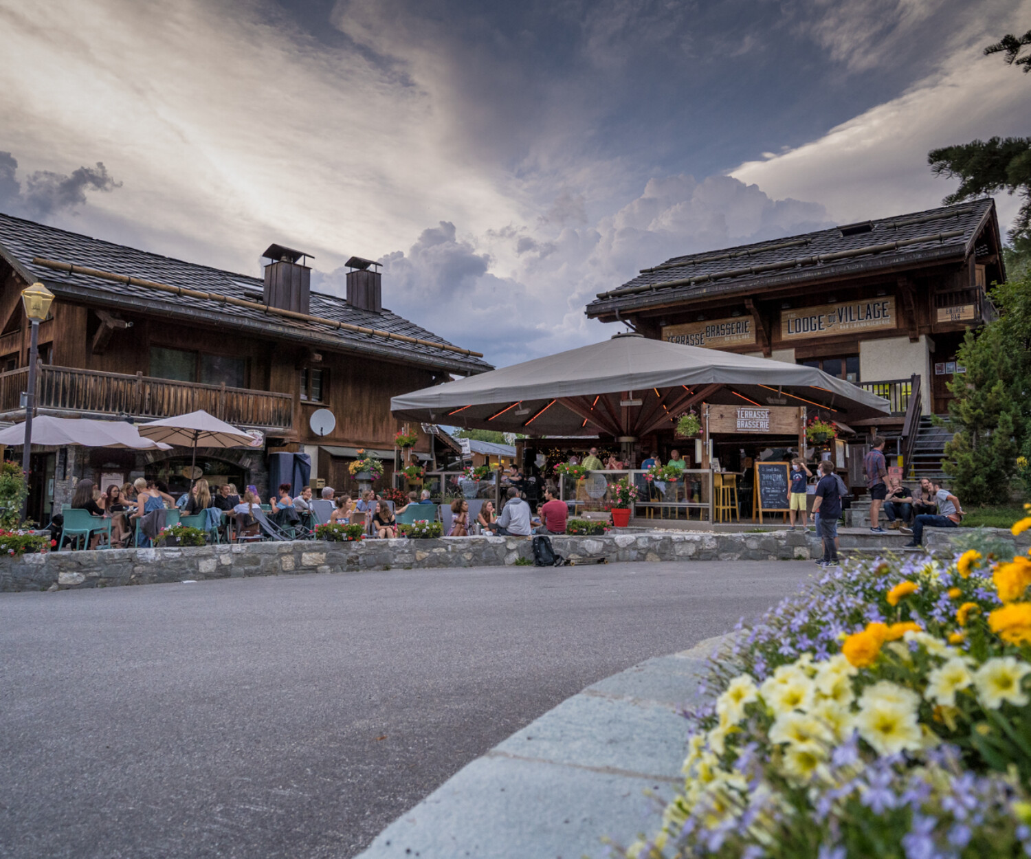 Sunny terrace at La Terrasse du Village in Méribel beyond winter